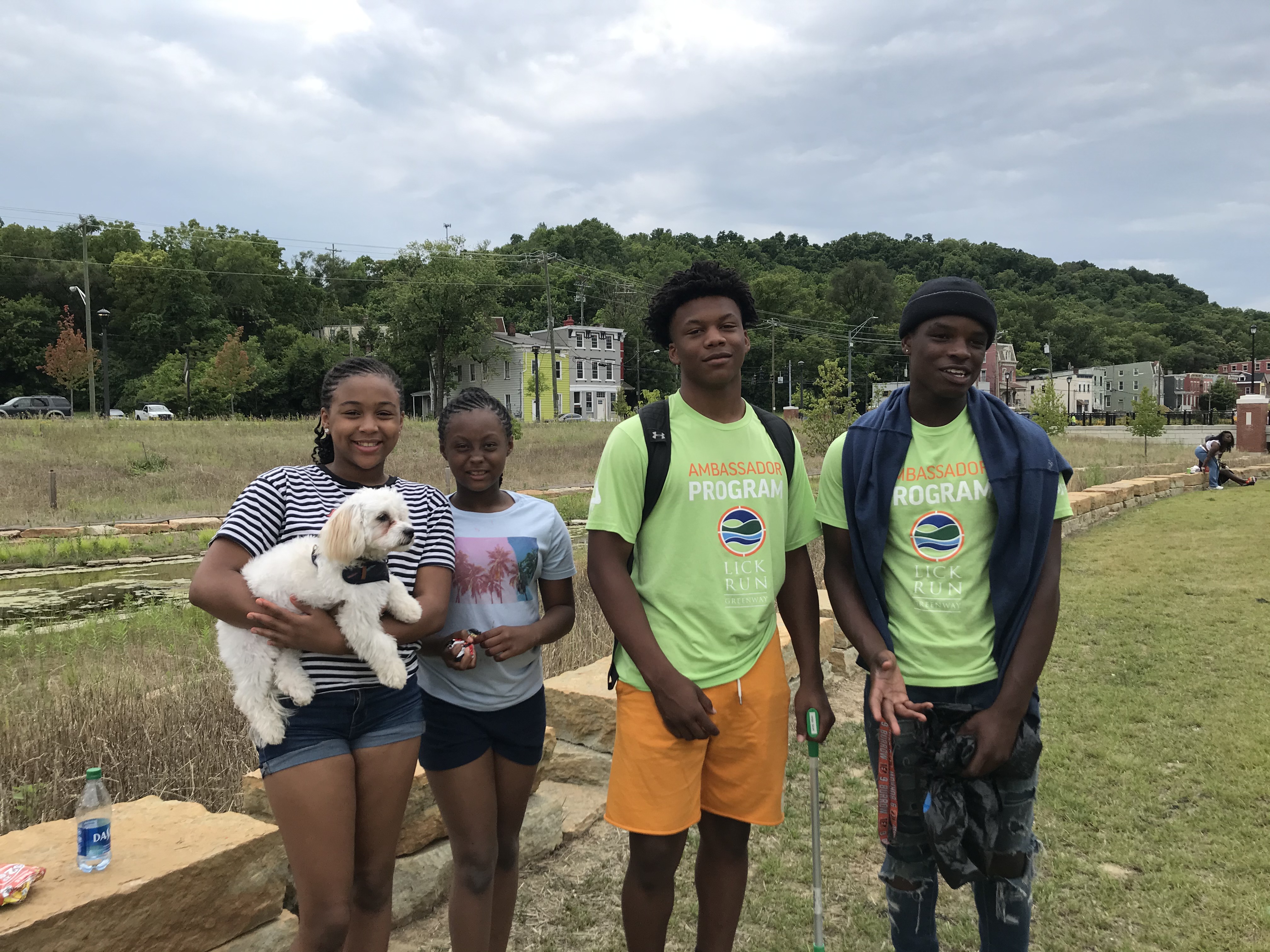 Photo of two youth workers with two guests