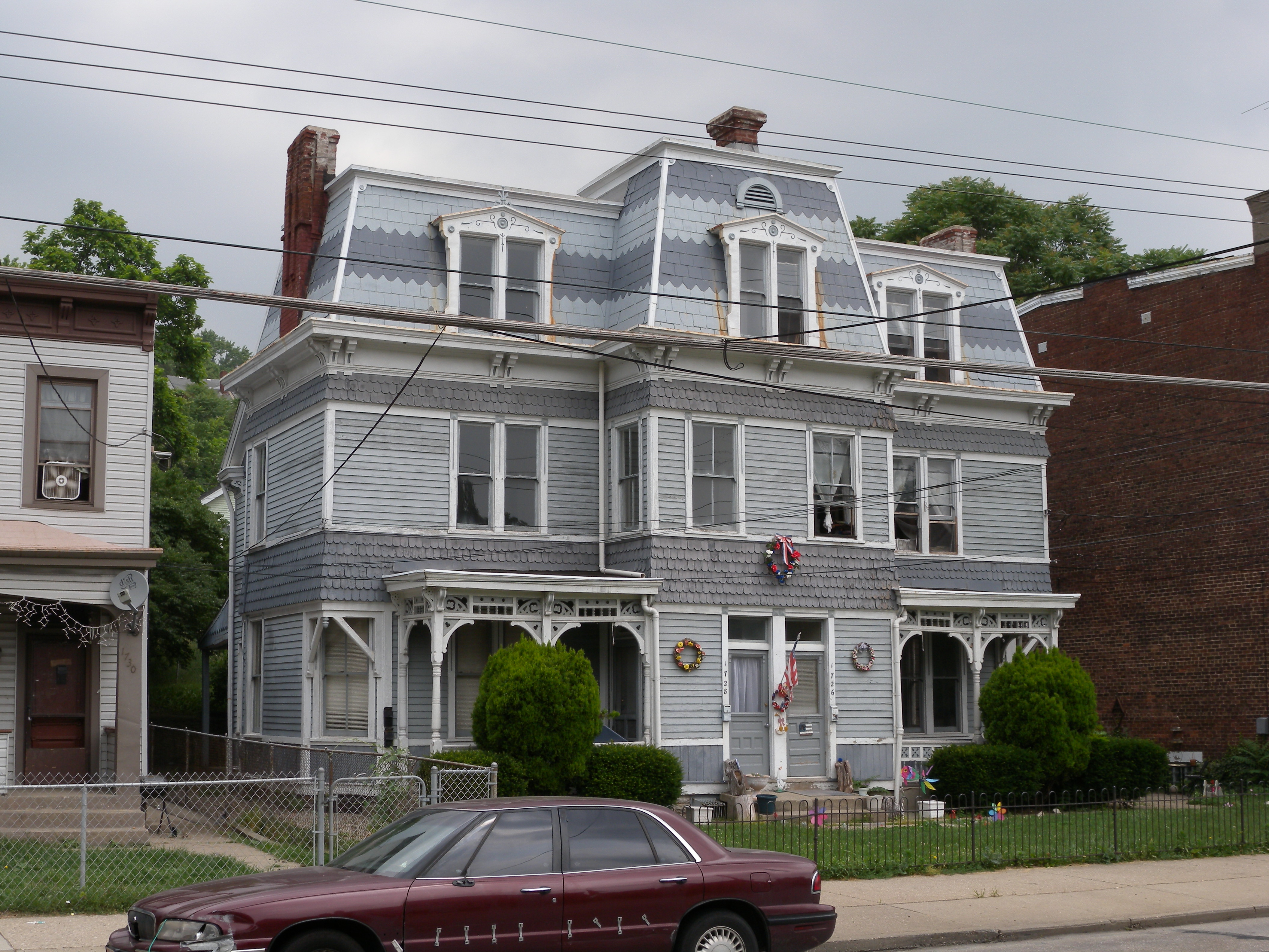 Second Empire style duplex on Queen City Avenue